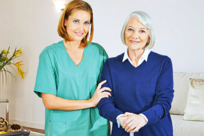 home health care and the senior woman patient smiling