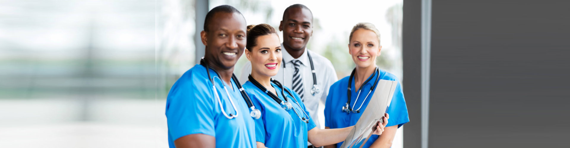 image of four people standing