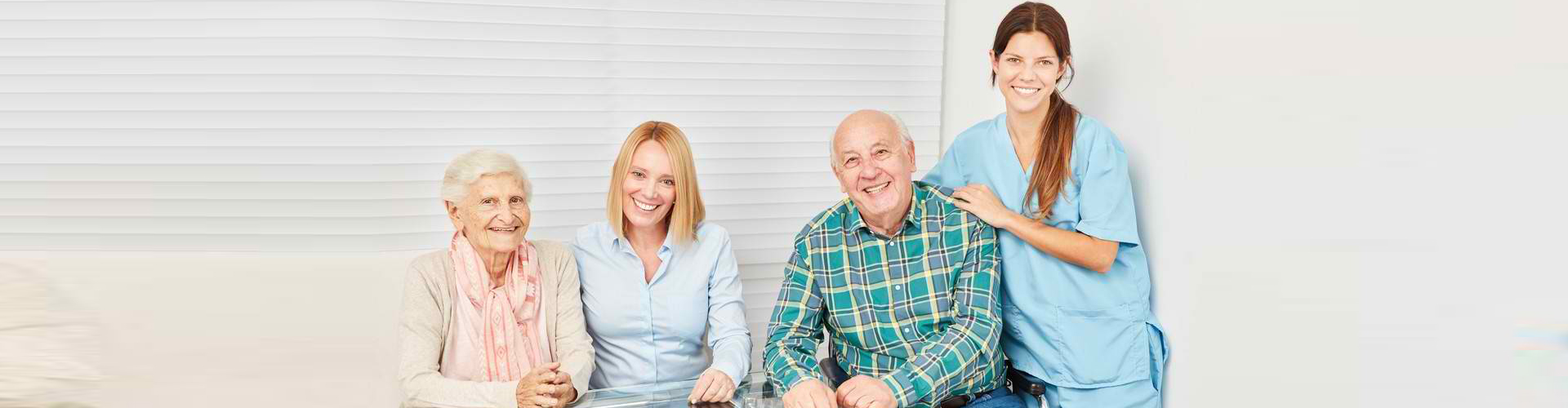 image of four people smiling